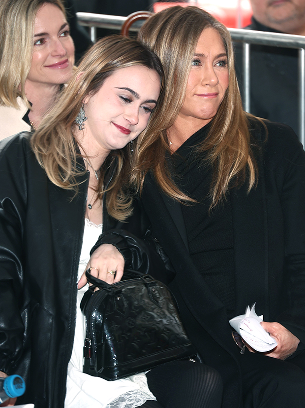 Coco Arquette and Jen Aniston lean on each other as they get emotional watching Courteney Cox be awared a star on the Hollywood Walk of Fame on Feb. 27, 2023
