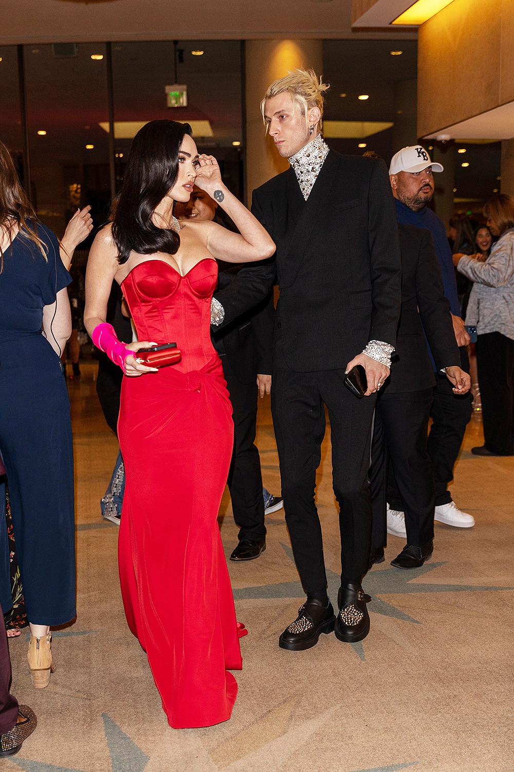 Machine Gun Kelly and Megan Fox arrive at Clive Davis' famed Grammy Party in Beverly Hills