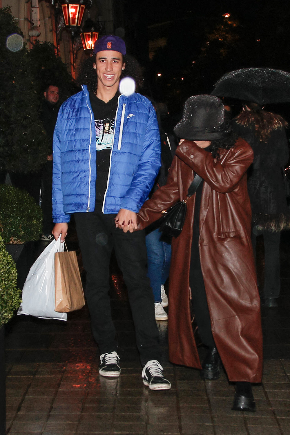 Vanessa Hudgens and Cole Tucker arriving at their hotel in Paris. 15 Nov 2022 Pictured: Vanessa Hudgens Cole Tucker. Photo credit: Spread Pictures / MEGA TheMegaAgency.com +1 888 505 6342 (Mega Agency TagID: MEGA918231_001.jpg) [Photo via Mega Agency]