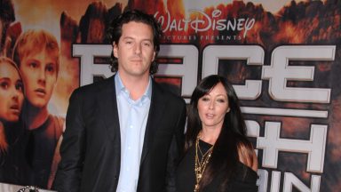 HOLLYWOOD - MARCH 11: Shannen Doherty and Kurt Iswarienko  arrive at the Los Angeles premiere of "Race To Witch Mountain"  at the El Capitan Theatre on March 11, 2009 in Hollywood, California. (Photo by Steve Granitz/WireImage)