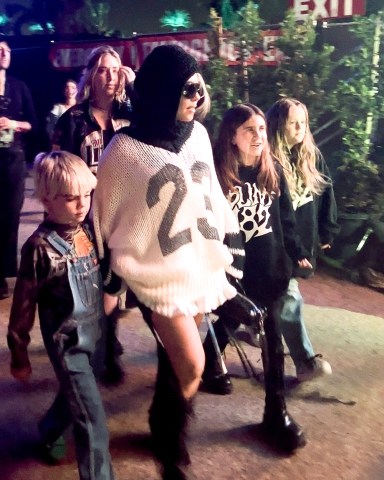 *EXCLUSIVE* Indio, CA  - Family time at Coachella! Kourtney Kardashian and her adorable kids spotted in the crowd, excitedly waiting to watch husband Travis Barker take the stage.Pictured: Kourtney KardashianBACKGRID USA 23 APRIL 2023 BYLINE MUST READ: Shotbyjuliann / BACKGRIDUSA: +1 310 798 9111 / usasales@backgrid.comUK: +44 208 344 2007 / uksales@backgrid.com*UK Clients - Pictures Containing ChildrenPlease Pixelate Face Prior To Publication*