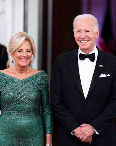 US President Joe Biden, First Lady Jill Biden and Narendra Modi, India's prime minister, during an arrival on the North Portico of the White House ahead of a state dinner in Washington, DC, US, on Thursday, June 22, 2023. Biden and Modi announced a series of defense and commercial deals designed to improve military and economic ties between their nations during a state visit today. Credit: Sarah Silbiger / Pool via CNP. 22 Jun 2023 Pictured: US President Joe Biden, right, and First Lady Jill Biden wait to greet Indian Prime Minister Narendra Modi, not pictured, during an arrival on the North Portico of the White House ahead of a state dinner in Washington, DC, US, on Thursday, June 22, 2023. Biden and Modi announced a series of defense and commercial deals designed to improve military and economic ties between their nations during a state visit today. Credit: Al Drago / Pool via CNP. Photo credit: Sarah Silbiger - Pool via CNP / MEGA TheMegaAgency.com +1 888 505 6342 (Mega Agency TagID: MEGA998886_001.jpg) [Photo via Mega Agency]