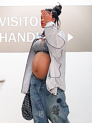 Rihanna sparkly bra and jeans in LA