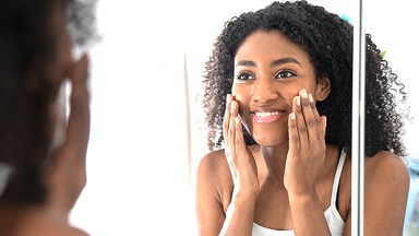 woman washing face