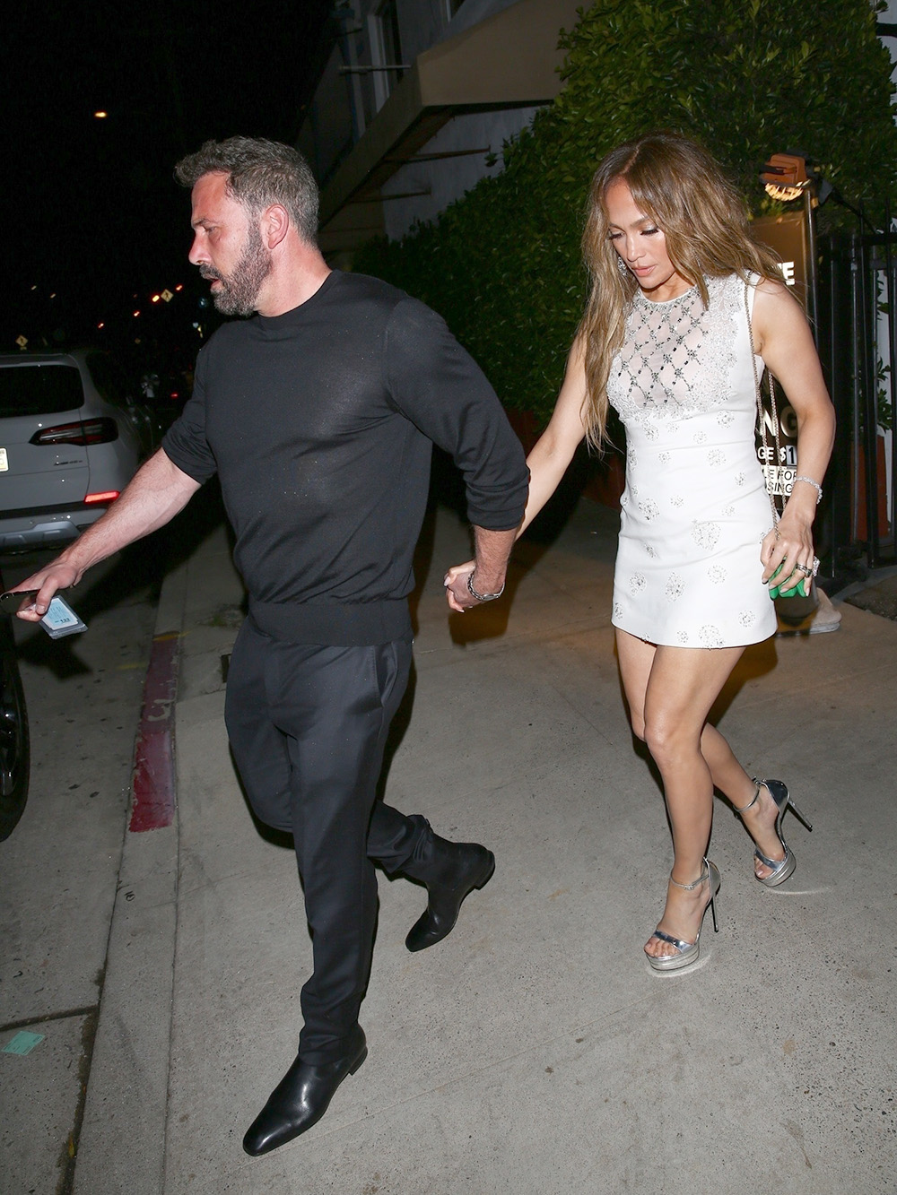 Santa Monica, CA  - *EXCLUSIVE*  -  Jennifer Lopez and Ben Affleck's Wedding Anniversary Celebrated with a Romantic Dinner in Santa Monica. The waiter brought a cake with a candle to the table for the wedding anniversary celebration. Leaving the restaurant Ben Affleck couldn't open his new Rivian electric car for Jennifer to get in and it took about 1 minute for him to open the car.

Pictured: Jennifer Lopez, Ben Affleck

BACKGRID USA 16 JULY 2023 

BYLINE MUST READ: The Hollywood JR / BACKGRID

USA: +1 310 798 9111 / usasales@backgrid.com

UK: +44 208 344 2007 / uksales@backgrid.com

*UK Clients - Pictures Containing Children
Please Pixelate Face Prior To Publication*