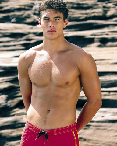 Editorial use only. No book publishingMandatory Credit: Photo by Fremantle Media/Shutterstock (312119q)Jason Momoa actor wearing swimming trunks with bare chestBAYWATCH HAWAII - 2000