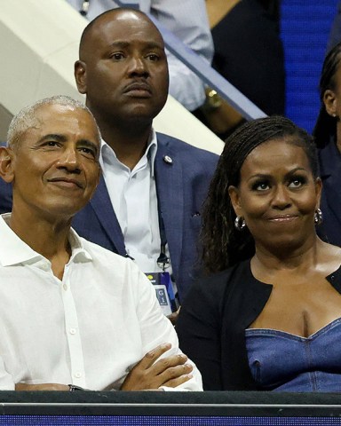 (L-R) Former President of the United States Barack Obama and train First Lady Michelle Obama awaits the 2023 U.S. Open tennis championships inside Arthur Ashe Stadium at the USTA Billie Jean King National Tennis Center in Flushing New York on August 28, 2023. (Photo by Andrew Schwartz) Celebrity Sightings at the 2023 US Open Tennis Championships, Queens, Usa - 29 Aug 2023