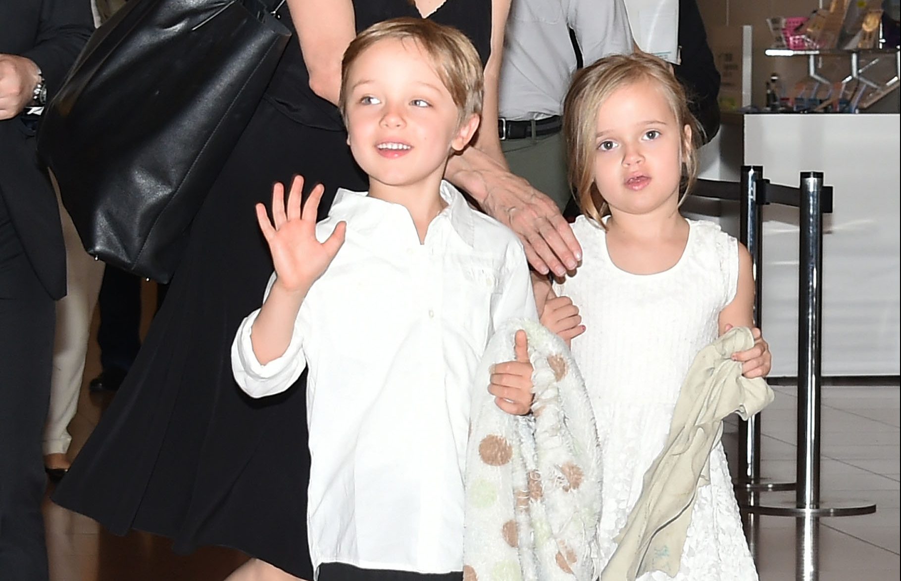 TOKYO, JAPAN - JUNE 21: Knox Jolie-Pitt, Angelina Jolie and Vivienne Jolie-Pitt are seen upon arrival at Haneda Airport on June 21, 2014 in Tokyo, Japan. (Photo by Jun Sato/GC Images)