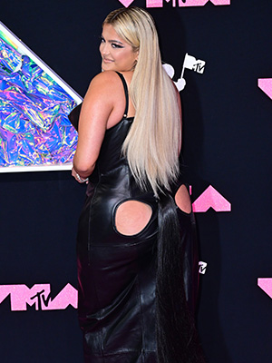 Bebe Rexha posing on the VMAs red carpet