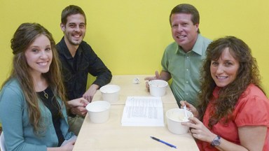 Jill Duggar and Derick Dillard sitting next to Jim Bob and Michelle Duggar