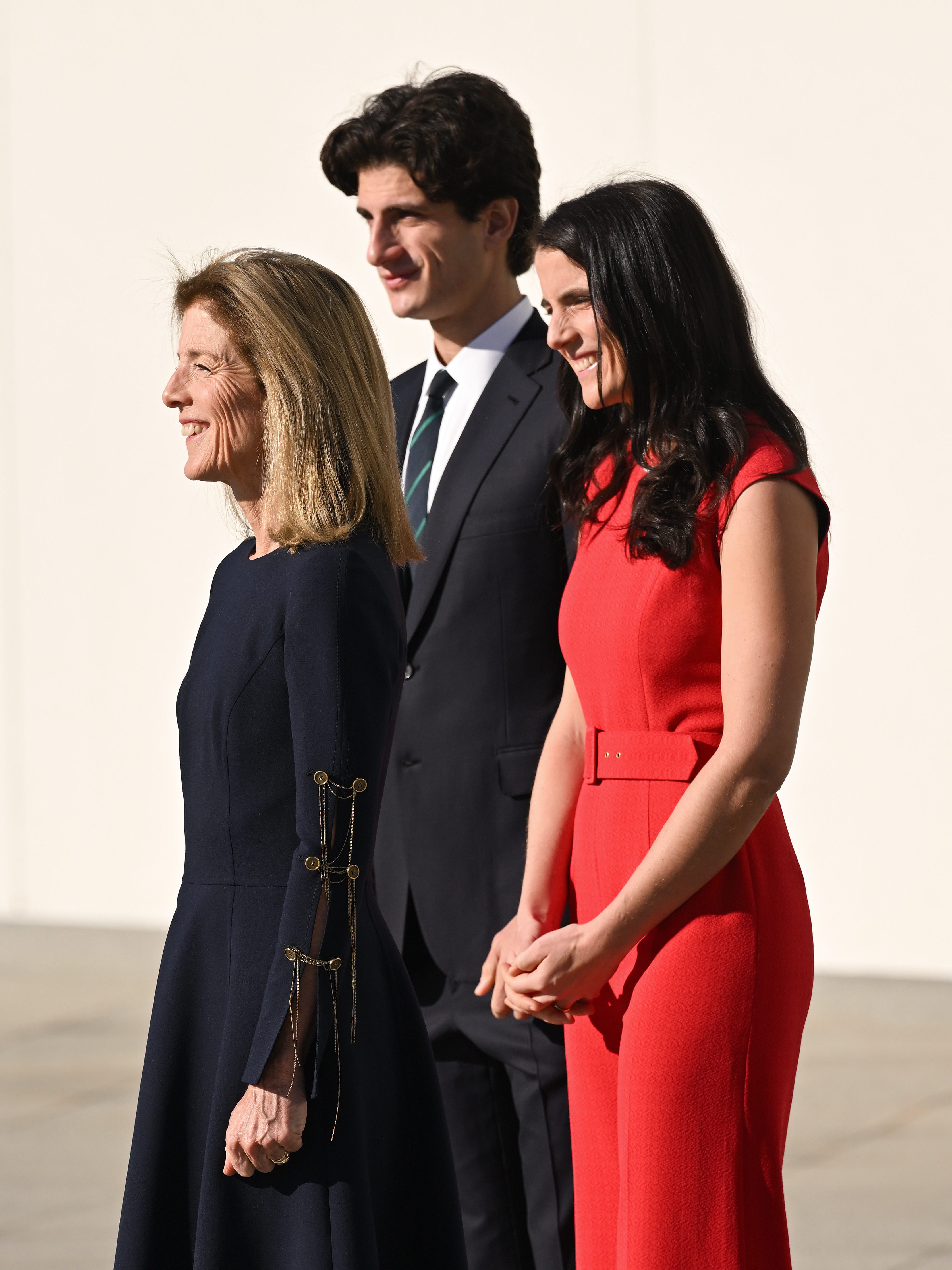 BOSTON, MASSACHUSETTS - DECEMBER 02: Ambassador Caroline Kennedy, Tatiana Schlossberg and Jack Schlossberg wait to greet Prince William, Prince of Wales during his visit to John F. Kennedy Presidential Library and Museum on December 02, 2022 in Boston, Massachusetts. The Prince and Princess of Wales are visiting the coastal city of Boston to attend the second annual Earthshot Prize Awards Ceremony, an event which celebrates those whose work is helping to repair the planet. During their trip, which will last for three days, the royal couple will learn about the environmental challenges Boston faces as well as meeting those who are combating the effects of climate change in the area. (Photo by Karwai Tang/WireImage)