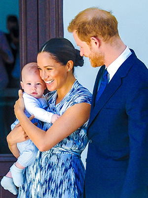 Meghan Markle holding son Prince Archie next to husband Prince Harry