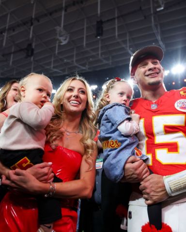 LAS VEGAS, NV - FEBRUARY 11: Patrick Mahomes #15 of the Kansas City Chiefs celebrates with his family after Super Bowl LVIII against the San Francisco 49ers at Allegiant Stadium on February 11, 2024 in Las Vegas, NV. (Photo by Perry Knotts/Getty Images)