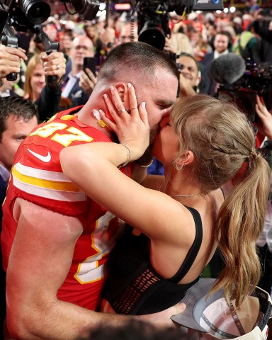 LAS VEGAS, NEVADA - FEBRUARY 11: Travis Kelce #87 of the Kansas City Chiefs kisses Taylor Swift after defeating the San Francisco 49ers 2 during Super Bowl LVIII at Allegiant Stadium on February 11, 2024 in Las Vegas, Nevada. (Photo by Ezra Shaw/Getty Images)