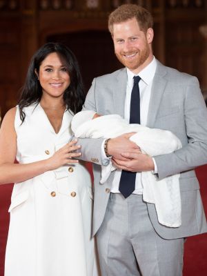 Meghan Markle and Prince Harry holding baby Archie