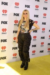 HOLLYWOOD, CALIFORNIA - APRIL 01: Avril Lavigne attends the 2024 iHeartRadio Music Awards  at Dolby Theatre on April 01, 2024 in Hollywood, California. (Photo by Aliah Anderson/WireImage)