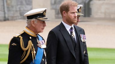 Britain's King Charles III (L) walks with his son Britain's Prince Harry, Duke of Sussex as they arrive at St George's Chapel inside Windsor Castle on September 19, 2022, ahead of the Committal Service for Britain's Queen Elizabeth II. Monday's committal service is expected to be attended by at least 800 people, most of whom will not have been at the earlier State Funeral at Westminster Abbey. (Photo by David Rose / POOL / AFP) (Photo by DAVID ROSE/POOL/AFP via Getty Images)