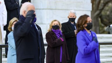 ARLINGTON, VA - JANUARY 20:   U.S. President Joe Biden and Vice President Kamala Harris attend a wreath-laying ceremony at Arlington National Cemetery's Tomb of the Unknown Soldier after the 59th Presidential Inauguration ceremony at the U.S. Capitol, as former U.S. President George W. Bush and Laura Bush, and former U.S. President Bill Clinton and former Secretary of State Hillary Clinton look on,  January 20, 2021  in Arlington, Virginia. During today's inauguration ceremony Joe Biden becomes the 46th president of the United States.   (Photo by Chip Somodevilla/Getty Images)