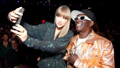 LOS ANGELES, CALIFORNIA - MARCH 27: (FOR EDITORIAL USE ONLY) (L-R) Taylor Swift and Flavor Flav attend the 2023 iHeartRadio Music Awards at Dolby Theatre in Los Angeles, California on March 27, 2023. Broadcasted live on FOX. (Photo by Kevin Mazur/Getty Images for iHeartRadio)