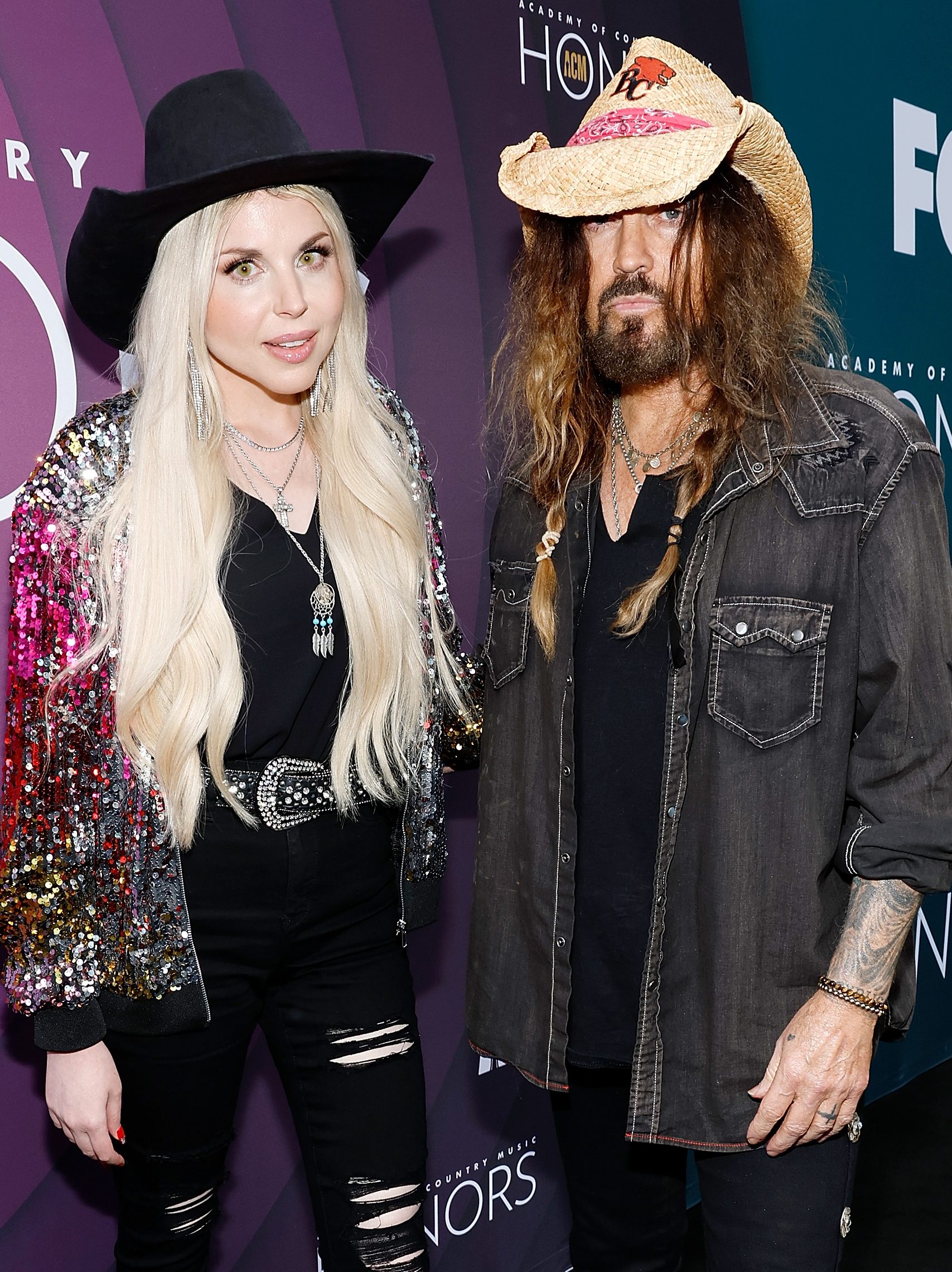 NASHVILLE, TENNESSEE - AUGUST 23: (L-R) FIREROSE and Billy Ray Cyrus attend the 16th Annual Academy of Country Music Honors at Ryman Auditorium on August 23, 2023 in Nashville, Tennessee. (Photo by Jason Kempin/Getty Images for ACM)