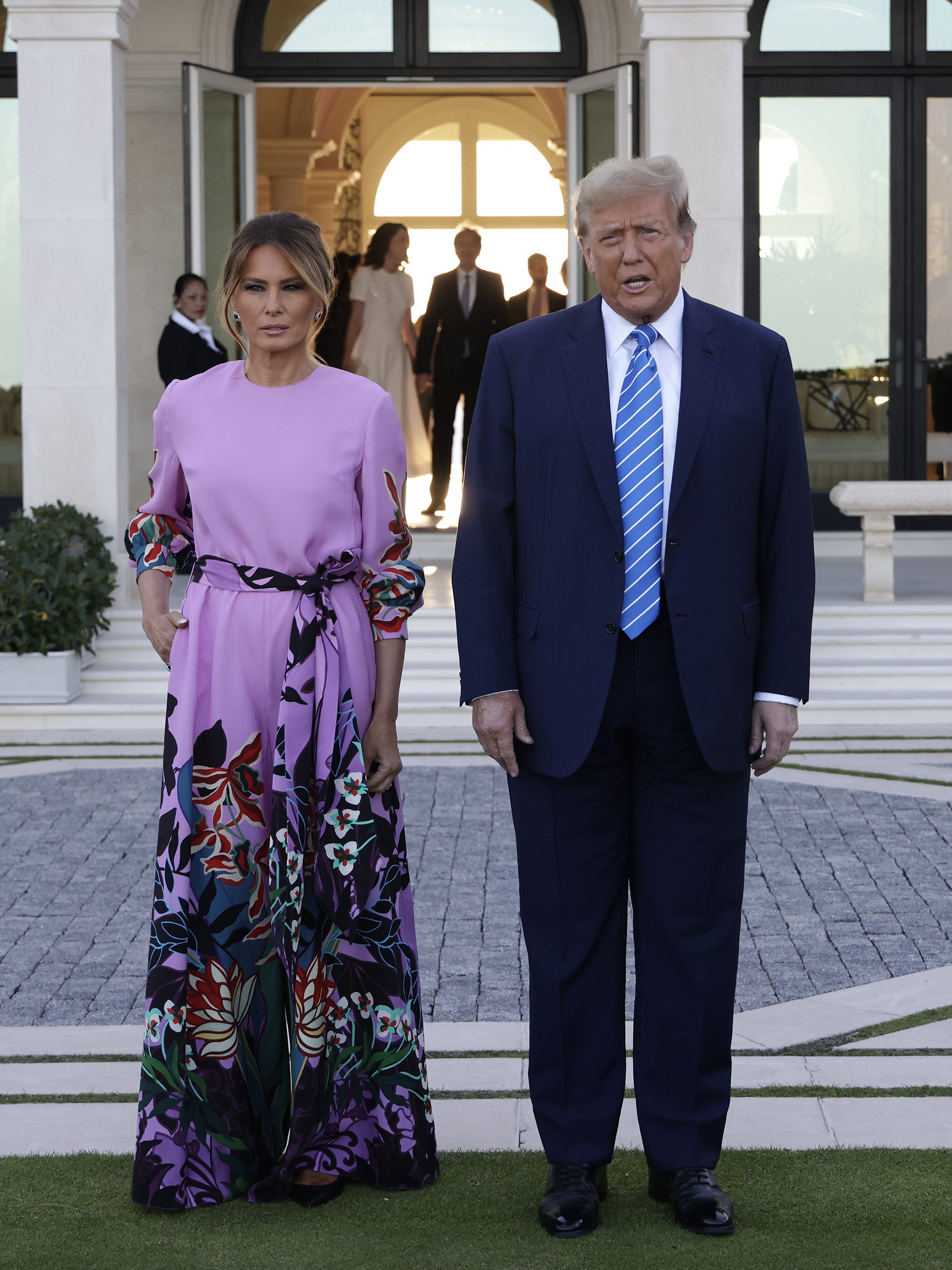 PALM BEACH, FLORIDA - APRIL 06: Republican presidential candidate, former US President Donald Trump and former first lady Melania Trump arrive at the home of billionaire investor John Paulson on April 6, 2024 in Palm Beach, Florida. Donald Trump's campaign is expecting to raise more than 40 million dollars when major donors gather a fundraiser billed as the "Inaugural Leadership Dinner". (Photo by Alon Skuy/Getty Images)