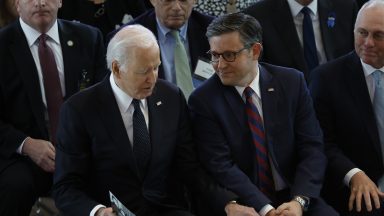 Joe Biden talks to Speaker of the House Mike Johnson (