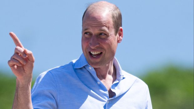 Prince William smiling on Fistral Beach