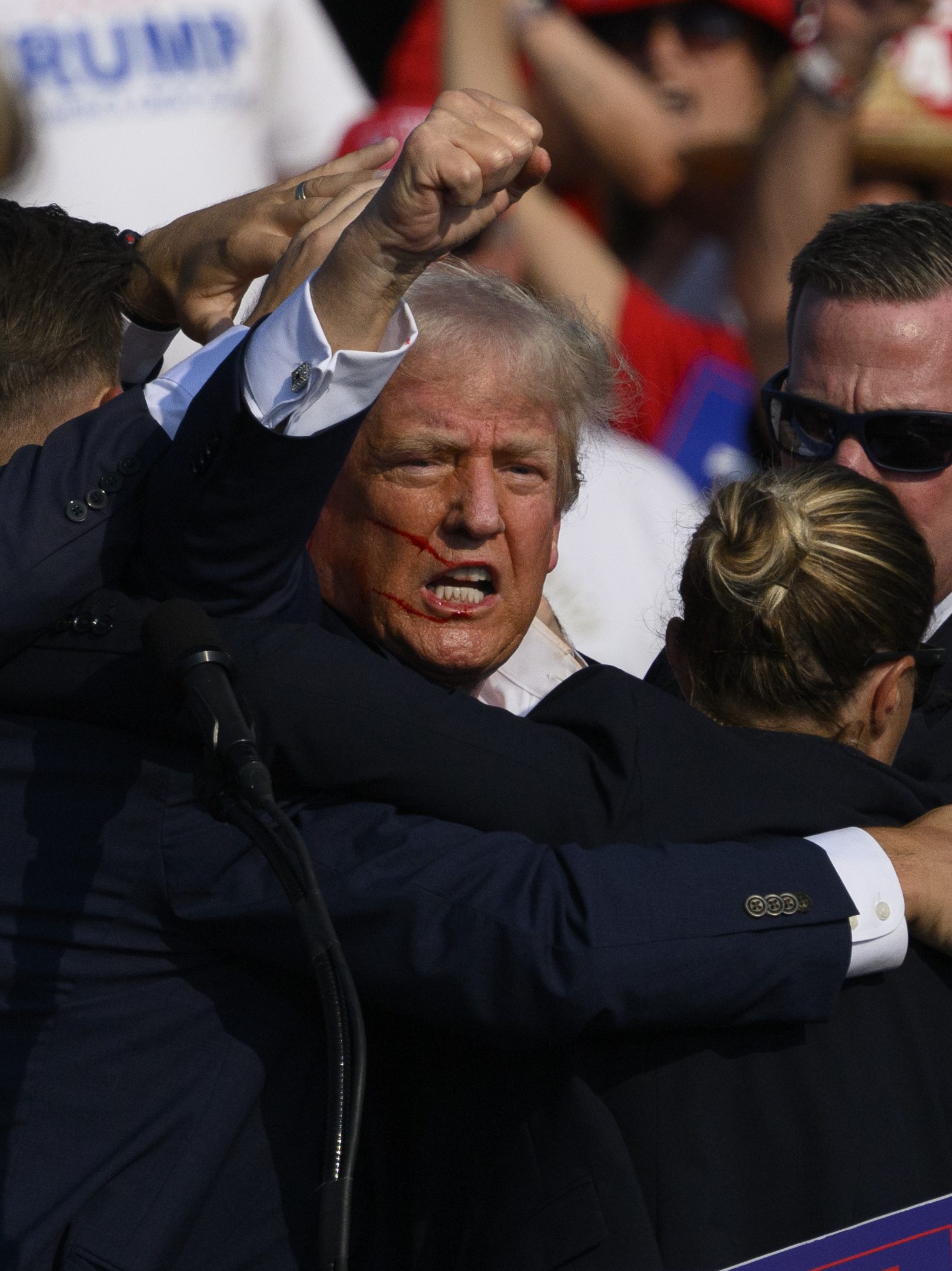 Donald Trump is whisked away by Secret Service