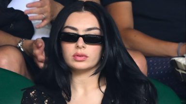 LONDON, ENGLAND - JULY 11: Charli XCX court-side of Centre Court on day eleven of the Wimbledon Tennis Championships at the All England Lawn Tennis and Croquet Club on July 11, 2024 in London, England. (Photo by Karwai Tang/WireImage)