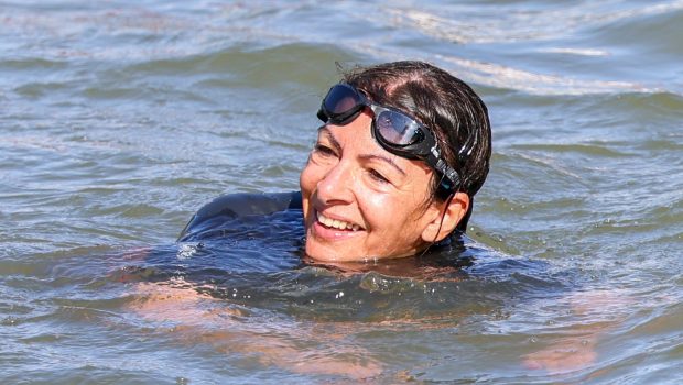 PARIS, FRANCE - JULY 17: Mayor of Paris Anne Hidalgo is seen swimming in the river Seine on July 17, 2024 in Paris, France. The city's mayor took a dip in the Seine amid concerns over water cleanliness ahead of the Olympic Games, in which the river will host triathlon and marathon swimming events. (Photo by Pierre Suu/Getty Images)