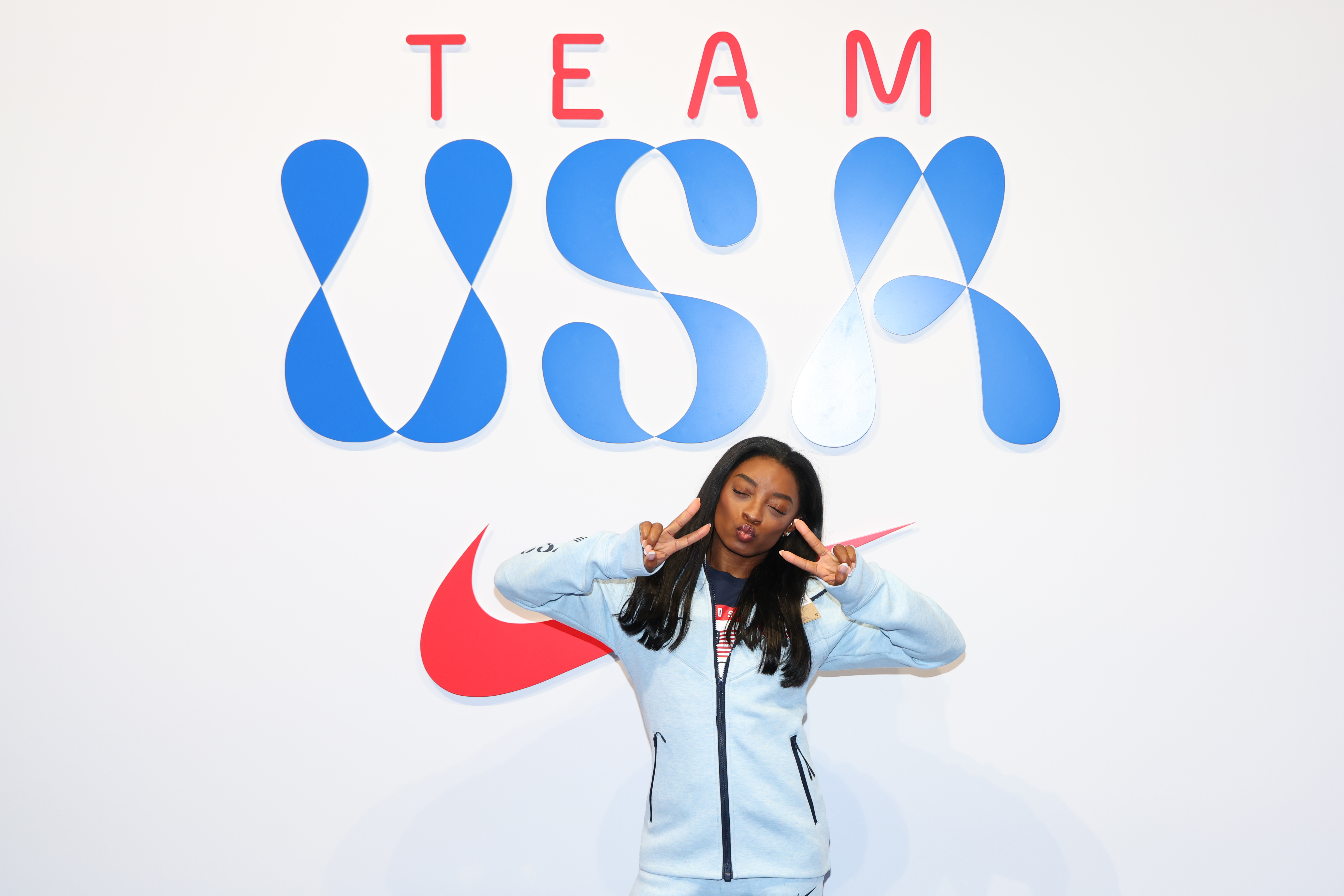 PARIS, FRANCE - JULY 22: Simone Biles tries on clothes at the Team USA Welcome Experience Ahead of Paris 2024 on July 22, 2024 in Paris, France. (Photo by Joe Scarnici/Getty Images for USOPC)