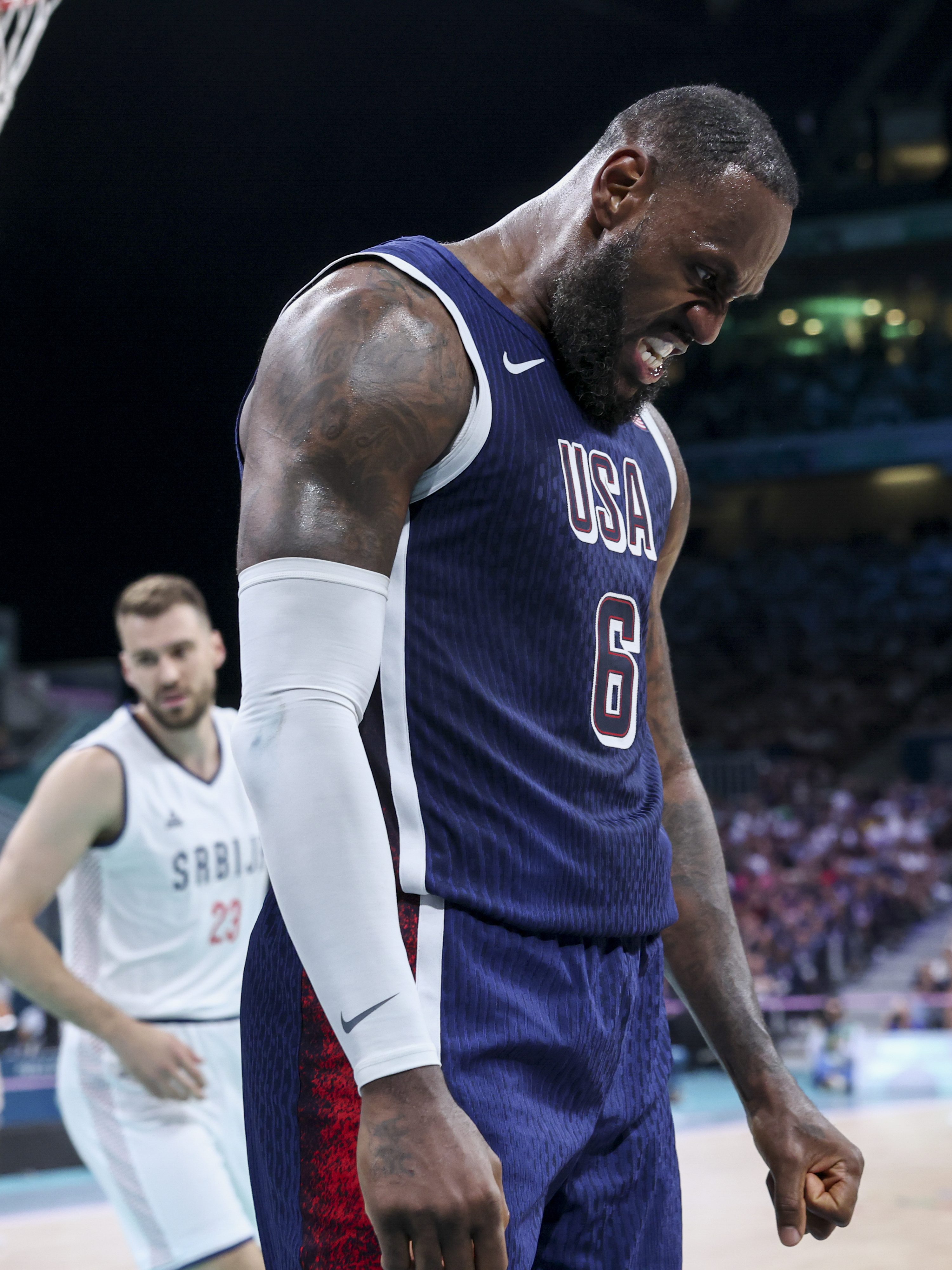 LILLE, FRANCE - JULY 28: LeBron James #6 of Team USA reacts to a play during the Men's Group Phase - Group C match between Serbia and USA on Day 2 of the Olympic Games Paris 2024 at Stade Pierre Mauroy on July 28, 2024 in Lille, France. (Photo by Catherine Steenkeste/Getty Images)