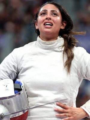 PARIS, FRANCE - JULY 29: Nada Hafez of Team Egypt shows emotion after her victory against Elizabeth Tartakovsky of Team United States (not pictured) in the Fencing Women's Sabre Individual Table of 32 on day three of the Olympic Games Paris 2024 at Grand Palais on July 29, 2024 in Paris, France. (Photo by Al Bello/Getty Images)