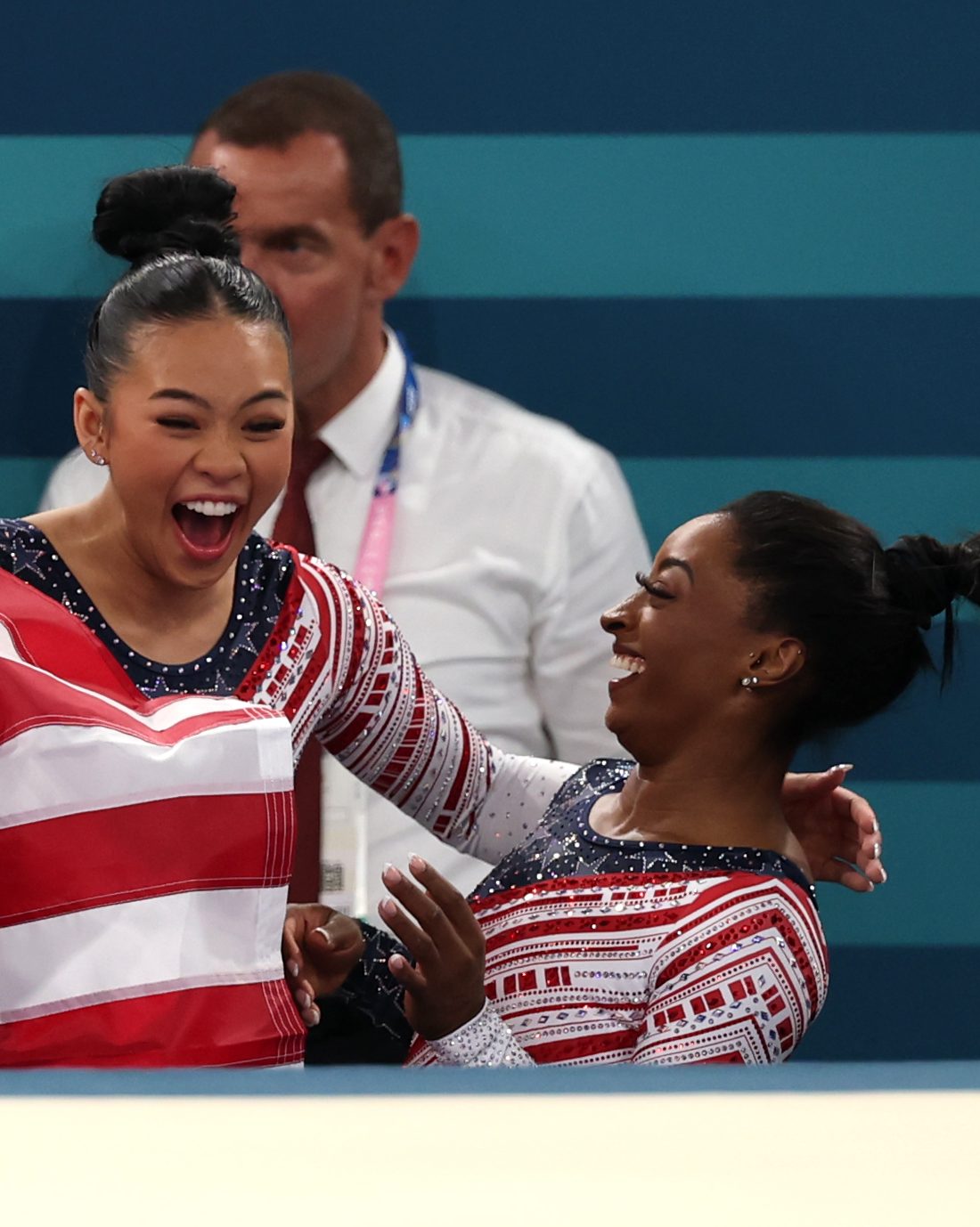 Sunisa Lee and Simone Biles of Team United States celebrate winning the gold medal
