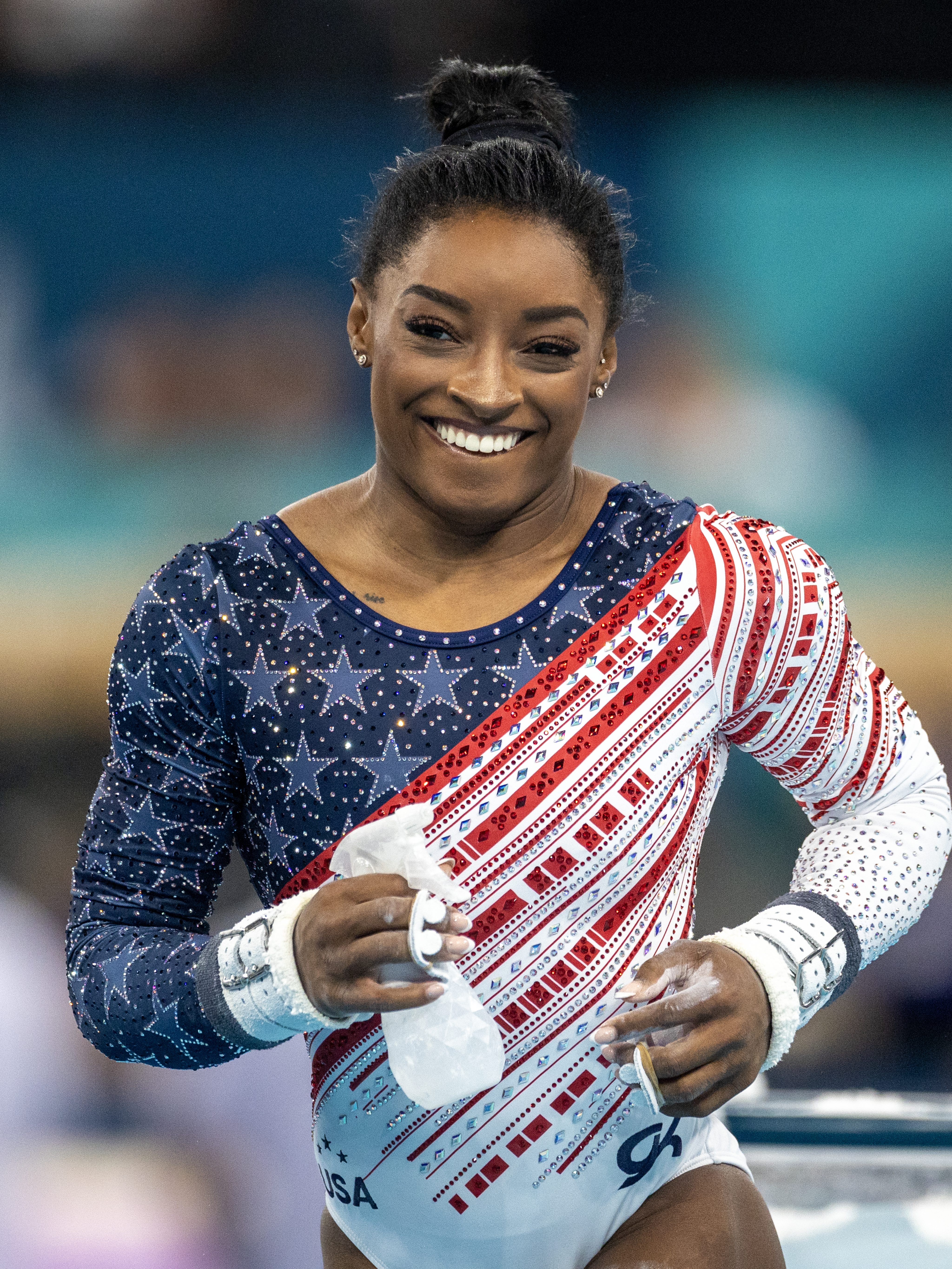 PARIS, FRANCE: JULY 30: Simone Biles of the United States reacts after performing her uneven bars routine during the Artistic Gymnastics Team Final for Women at the Bercy Arena during the Paris 2024 Summer Olympic Games on July 30th, 2024 in Paris, France. (Photo by Tim Clayton/Corbis via Getty Images)