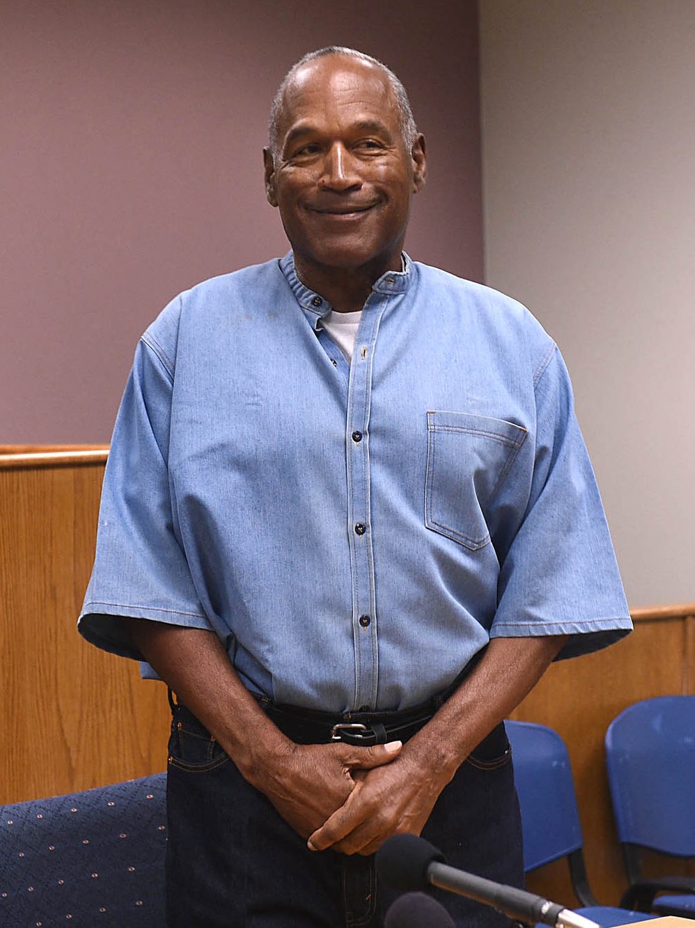 TOPSHOT - O.J. Simpson looks on during a parole hearing in Lovelock, Nevada on July 20, 2017. - Former American football star O.J. Simpson has spent nearly nine years in prison. A Nevada parole board is holding the hearing to decide whether the former National Football League (NFL) star and actor should be released from prison. (Photo by Jason Bean / POOL / AFP) (Photo by JASON BEAN/POOL/AFP via Getty Images)