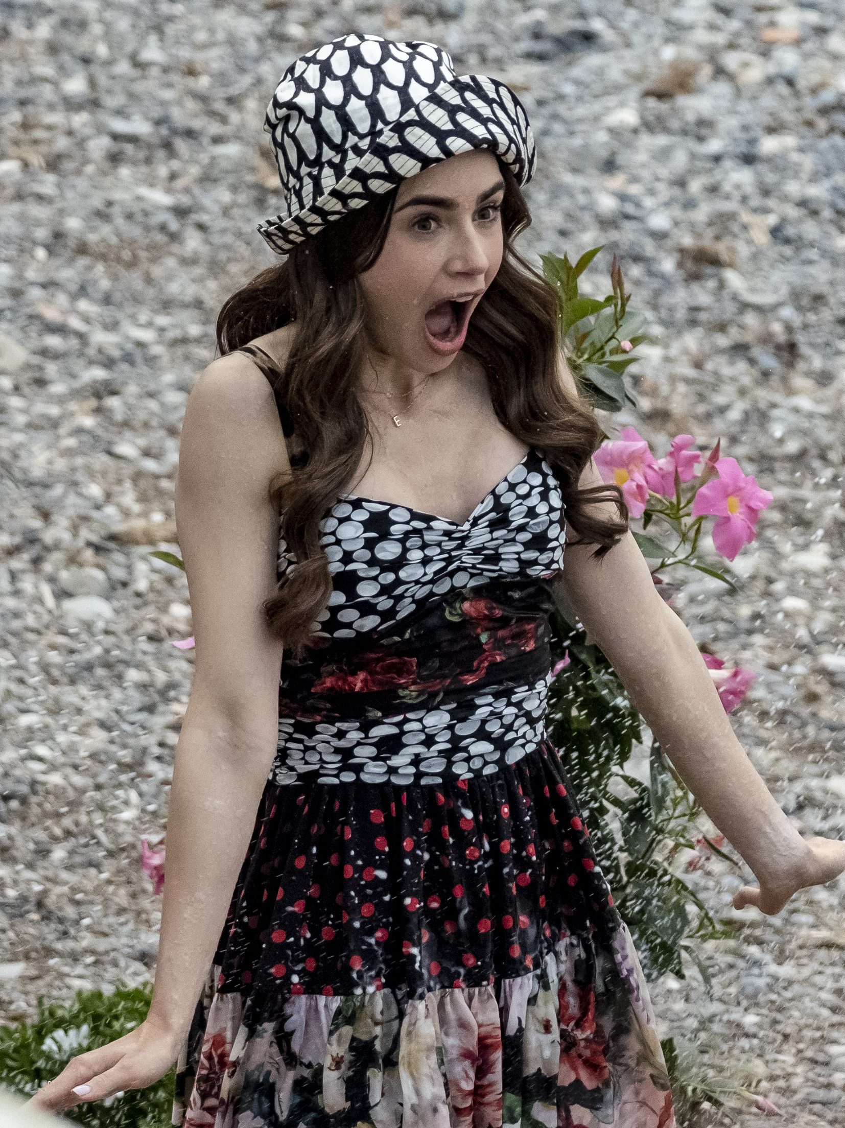 Lily Collins is seen filming "Emily in Paris"