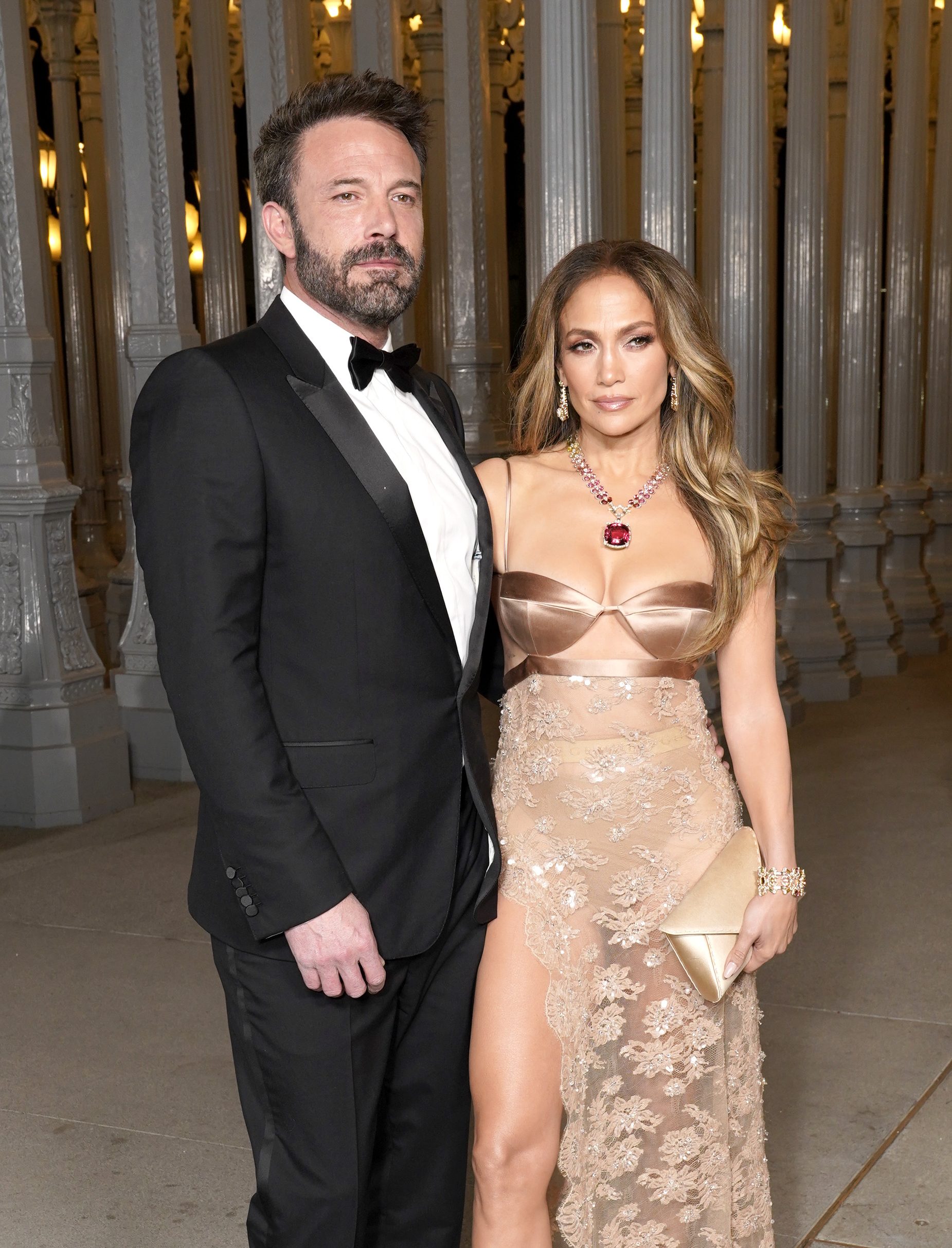 Ben Affleck, wearing Gucci, and Jennifer Lopez, wearing Gucci,