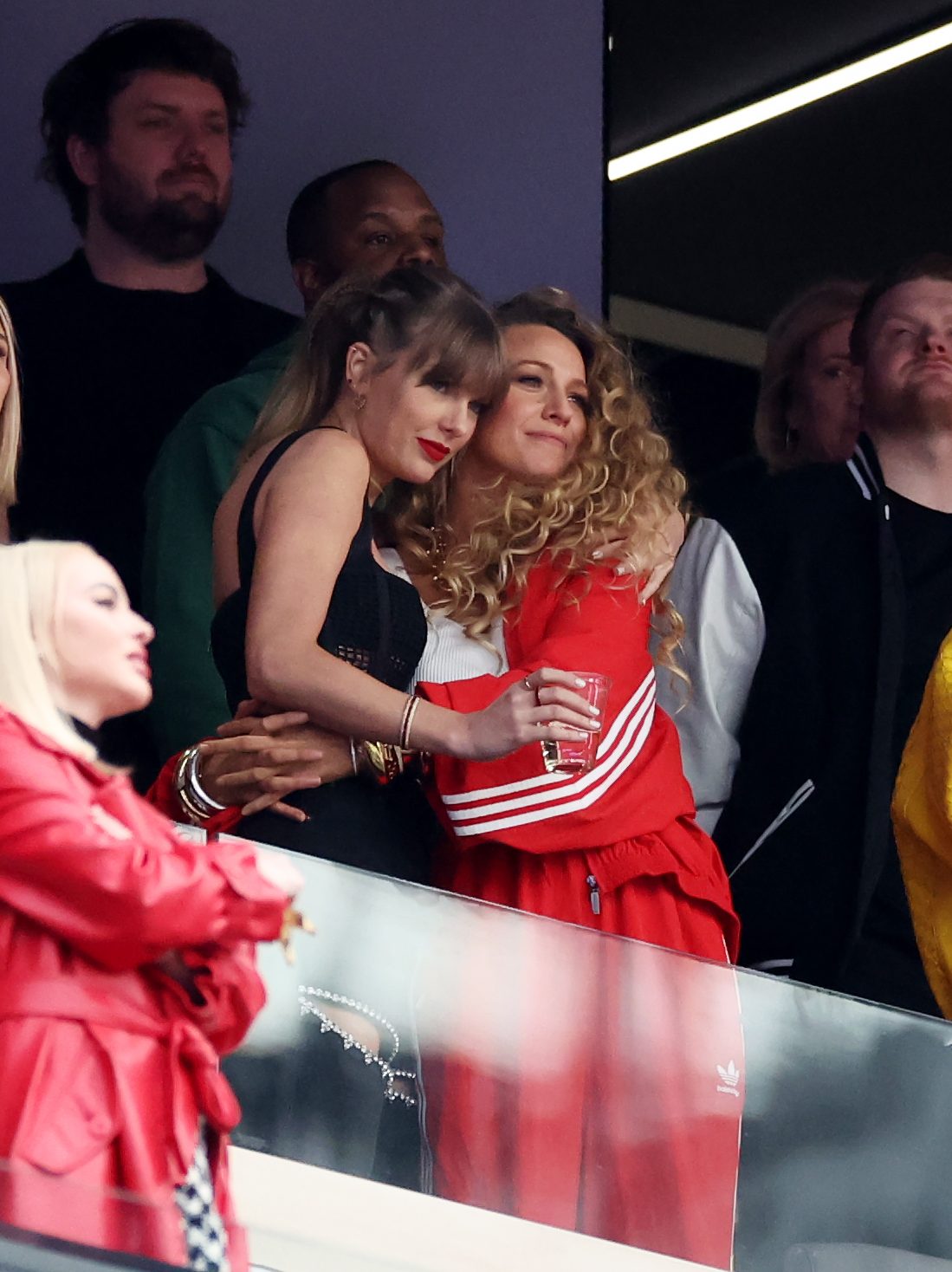 LAS VEGAS, NEVADA - FEBRUARY 11: Rapper Ice Spice, Singer Taylor Swift and Actress Blake Lively hug prior to Super Bowl LVIII between the San Francisco 49ers and Kansas City Chiefs at Allegiant Stadium on February 11, 2024 in Las Vegas, Nevada. (Photo by Ezra Shaw/Getty Images)