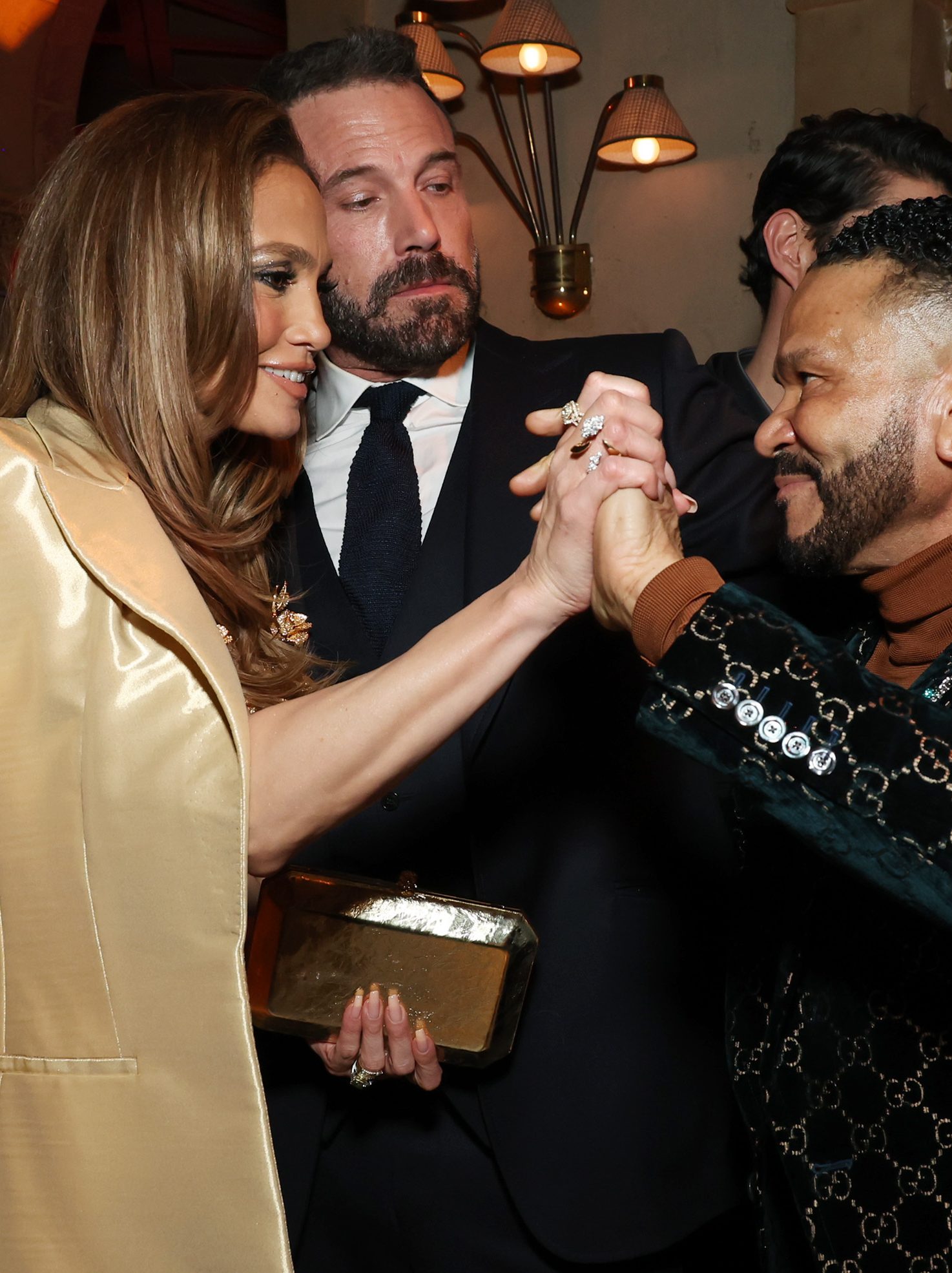 HOLLYWOOD, CALIFORNIA - FEBRUARY 13:  (L-R) Jennifer Lopez, Ben Affleck, and Benny Medina attend the after party for the Los Angeles premiere of Amazon MGM Studios "This Is Me...Now: A Love Story" on February 13, 2024 in Hollywood, California. (Photo by Monica Schipper/GA/The Hollywood Reporter via Getty Images)