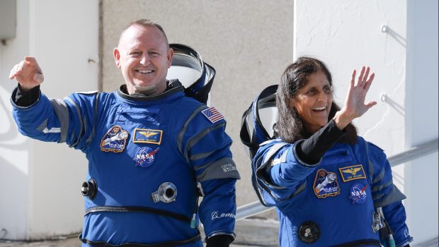 CAPE CANAVERAL, FLORIDA - JUNE 01: NASA’s Boeing Crew Flight Test Commander Butch Wilmore (L) and Pilot Suni Williams walk out of the Operations and Checkout Building on June 01, 2024 in Cape Canaveral, Florida. The astronauts are heading to Boeing’s Starliner spacecraft, which sits atop a United Launch Alliance Atlas V rocket at Space Launch Complex 41 for NASA’s Boeing crew flight test to the International Space Station. (Photo by Joe Raedle/Getty Images)