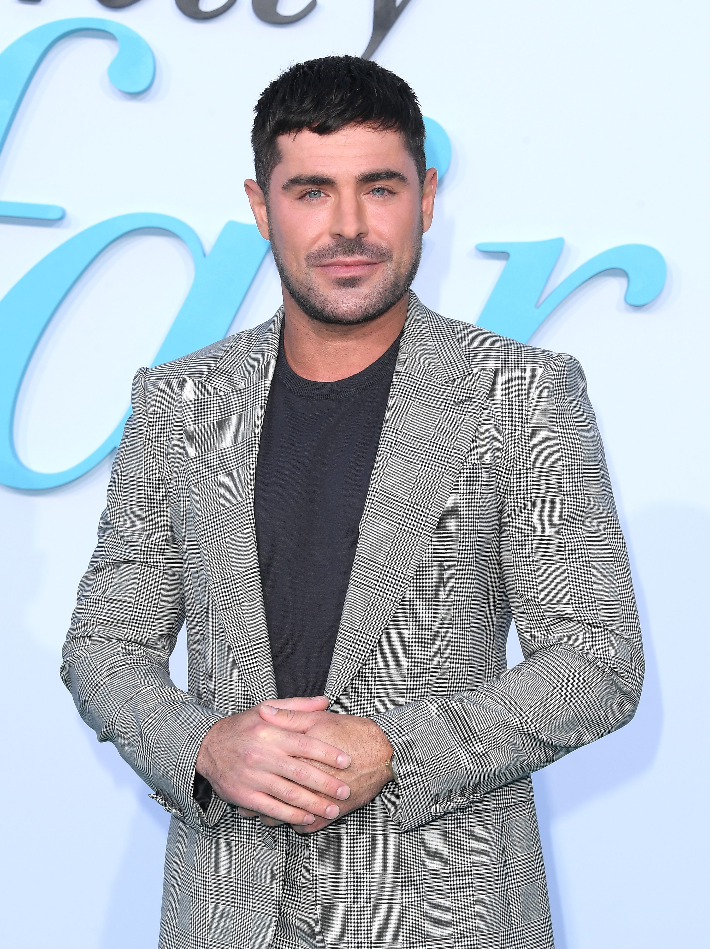 Zac Efron arrives at the Los Angeles Premiere Of Netflix's "A Family Affair"