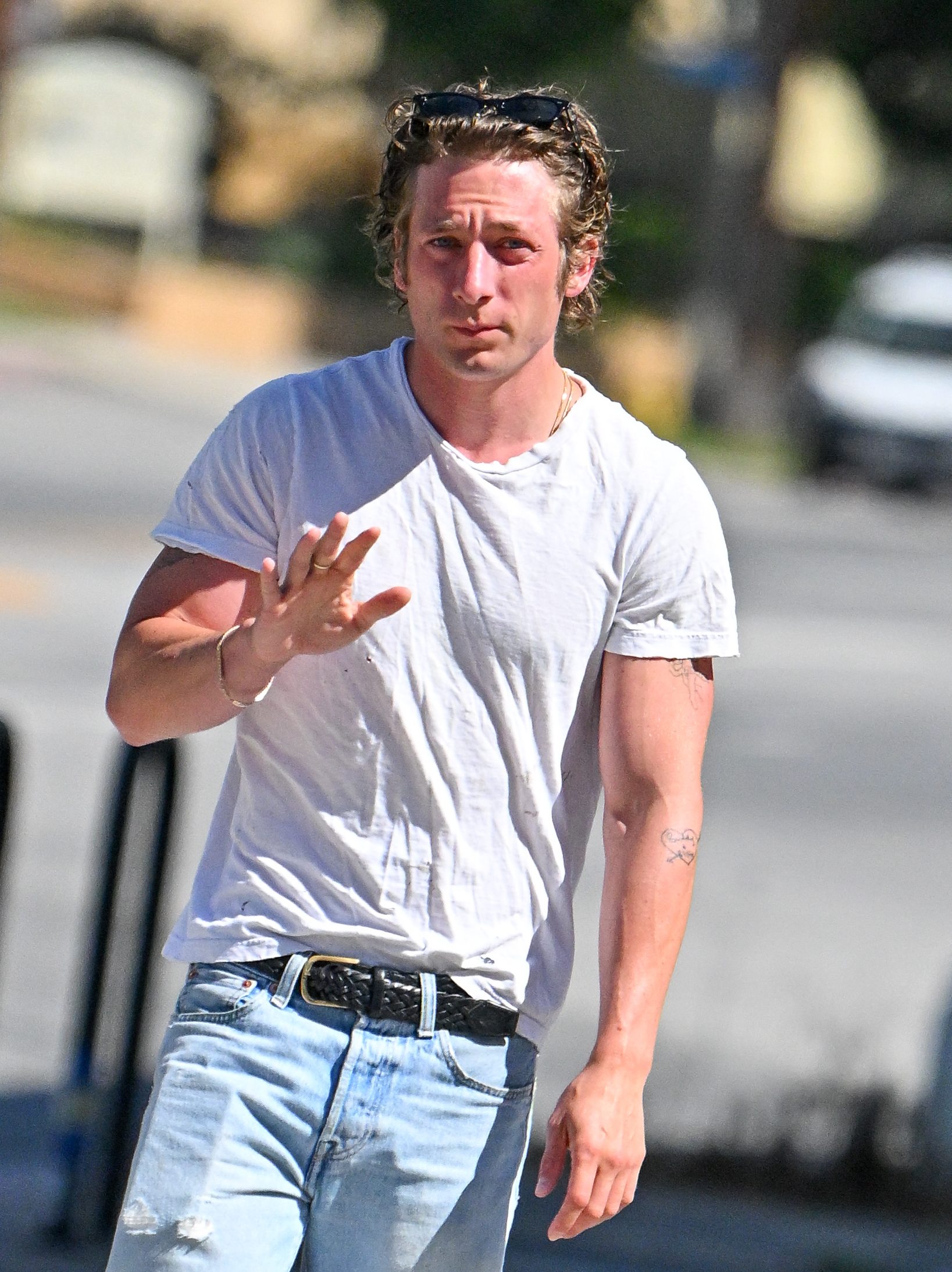 Jeremy Allen White walking to Joan's on Third in Los Angeles, California.