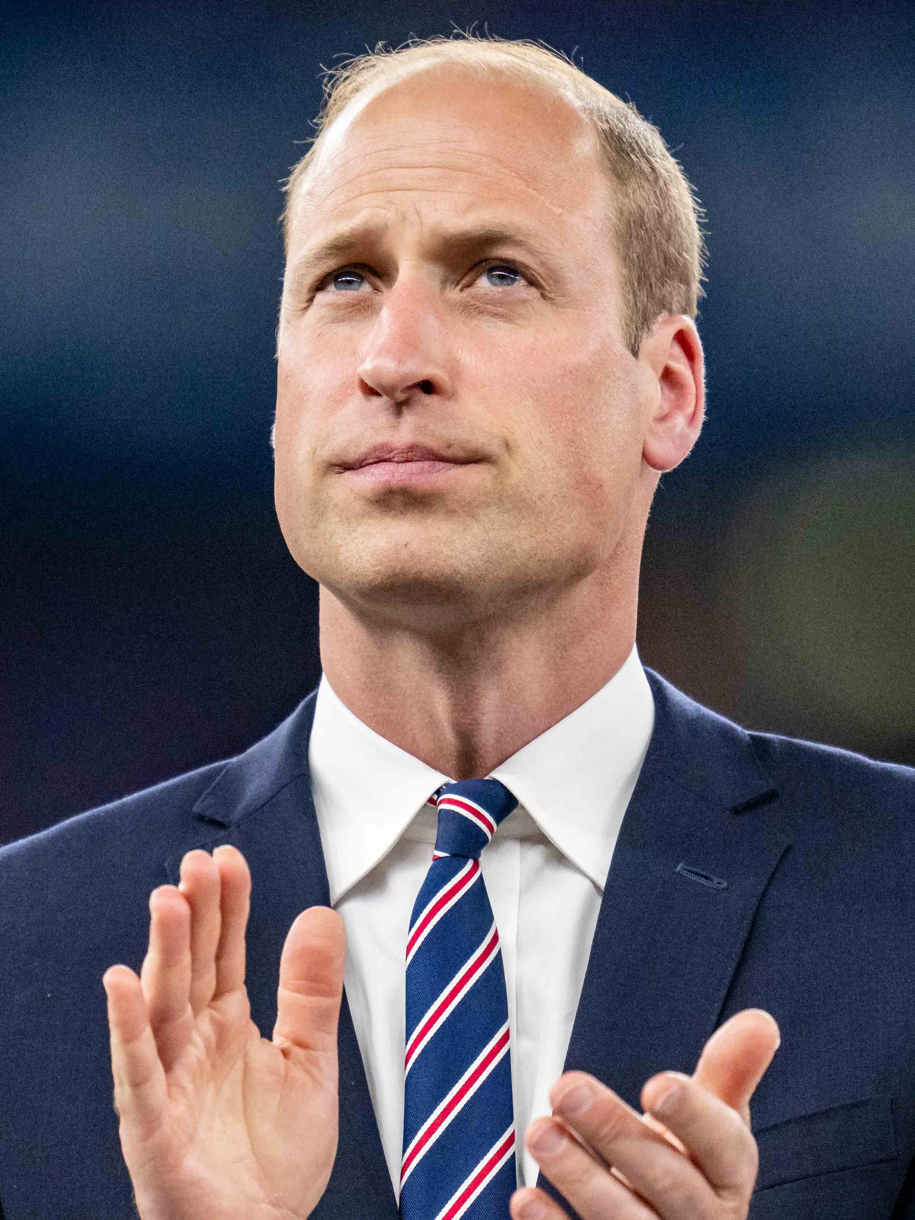 BERLIN, GERMANY - JULY 14: Prince William of Wales looks on as he stands on the stage before presenting medals after the UEFA EURO 2024 final match between Spain and England at Olympiastadion on July 14, 2024 in Berlin, Germany. (Photo by Kevin Voigt/GettyImages)