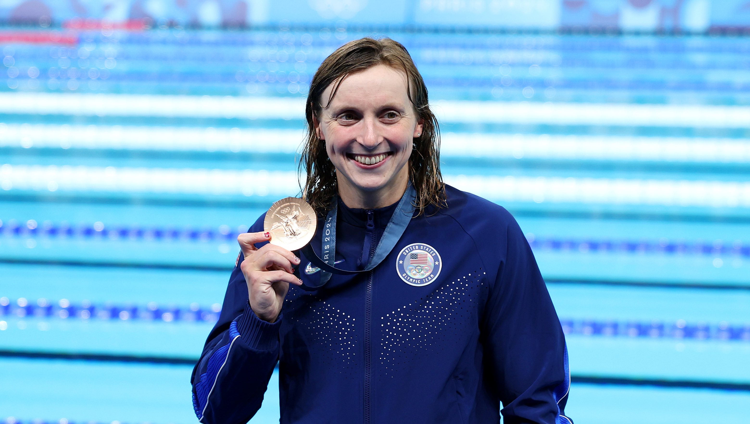 NANTERRE, FRANCE - JULY 27: Bronze Medalist, Katie Ledecky  of Team United States poses with her medal following the Medal Ceremony after the Women's 400m Freestyle Final on day one of the Olympic Games Paris 2024 at Paris La Defense Arena on July 27, 2024 in Nanterre, France. (Photo by Sarah Stier/Getty Images)