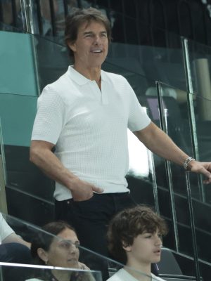 PARIS, FRANCE - JULY 28: Tom Cruise attends day two of the Paris 2024 Olympic Games at the artistic gymnastics event with Simone Biles of USA at Paris Arena on July 28, 2024 in Paris, France. (Photo by Jean Catuffe/Getty Images)