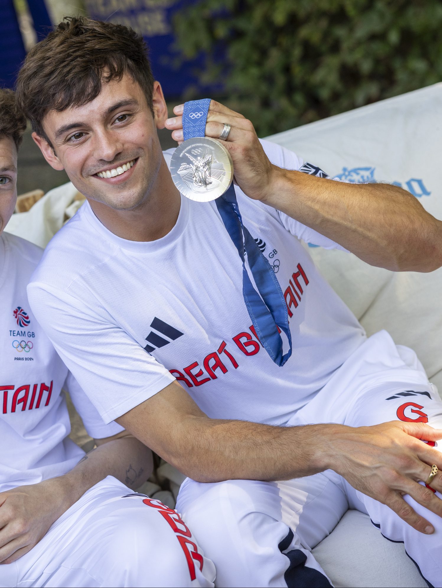 PARIS, FRANCE - JULY 29: Tom Daley (R) and Noah Williams of Team GB show off their silver medals after finishing second in 10m synchronised Platform at Olympic Games Paris 2024 at Team GB House on July 29, 2024 in Paris, France. (Photo by Matt Greaves/Team GB via Getty Images)