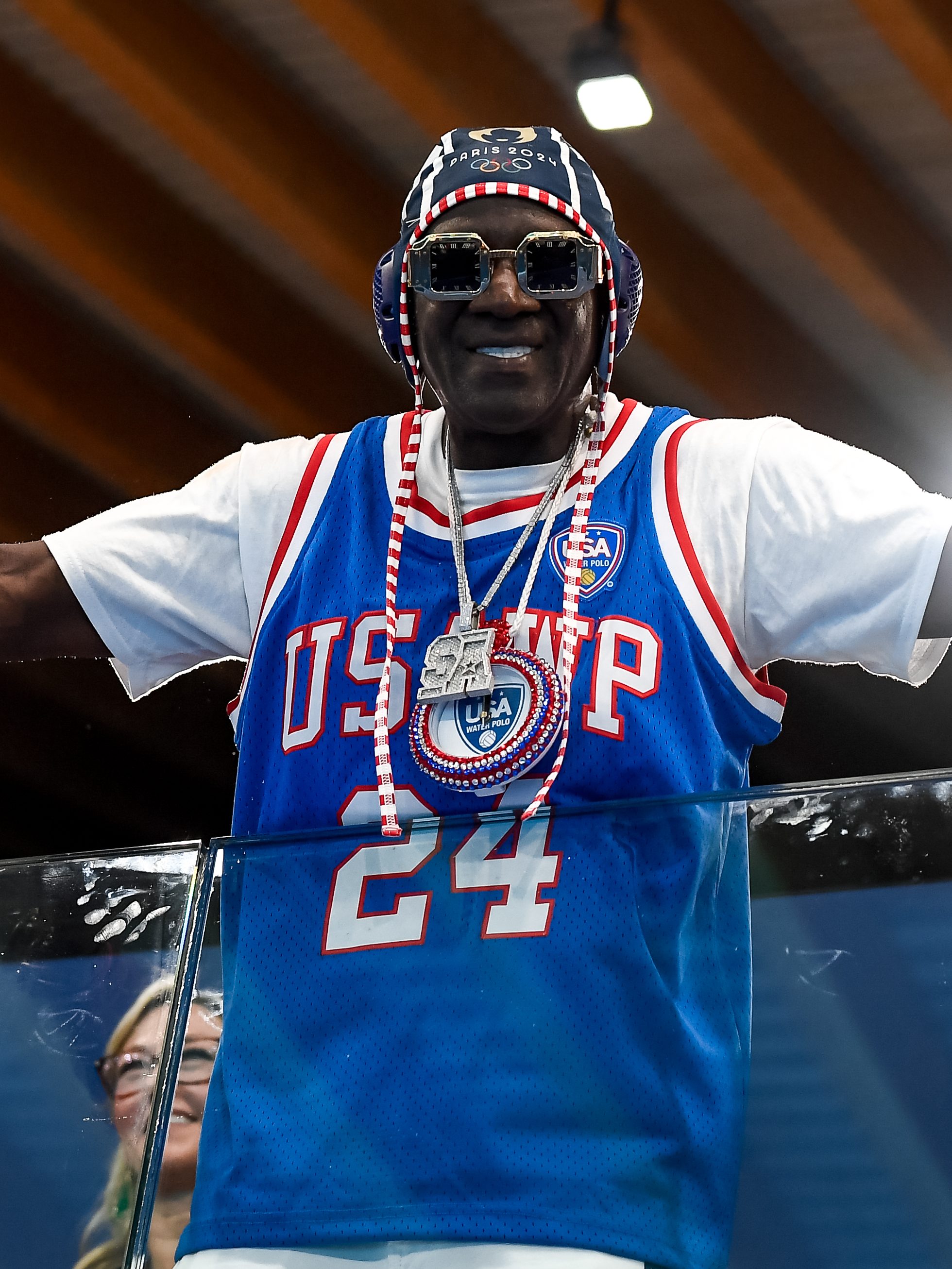 Flavor Flav during the water polo women match between team Italy (white caps) and team United States of America (blue caps) of the Paris 2024 Olympic Games at Aquatics Centre. Paris (France), July 31st 2024  (Photo by Deepbluemedia/Mondadori Portfolio via Getty Images)