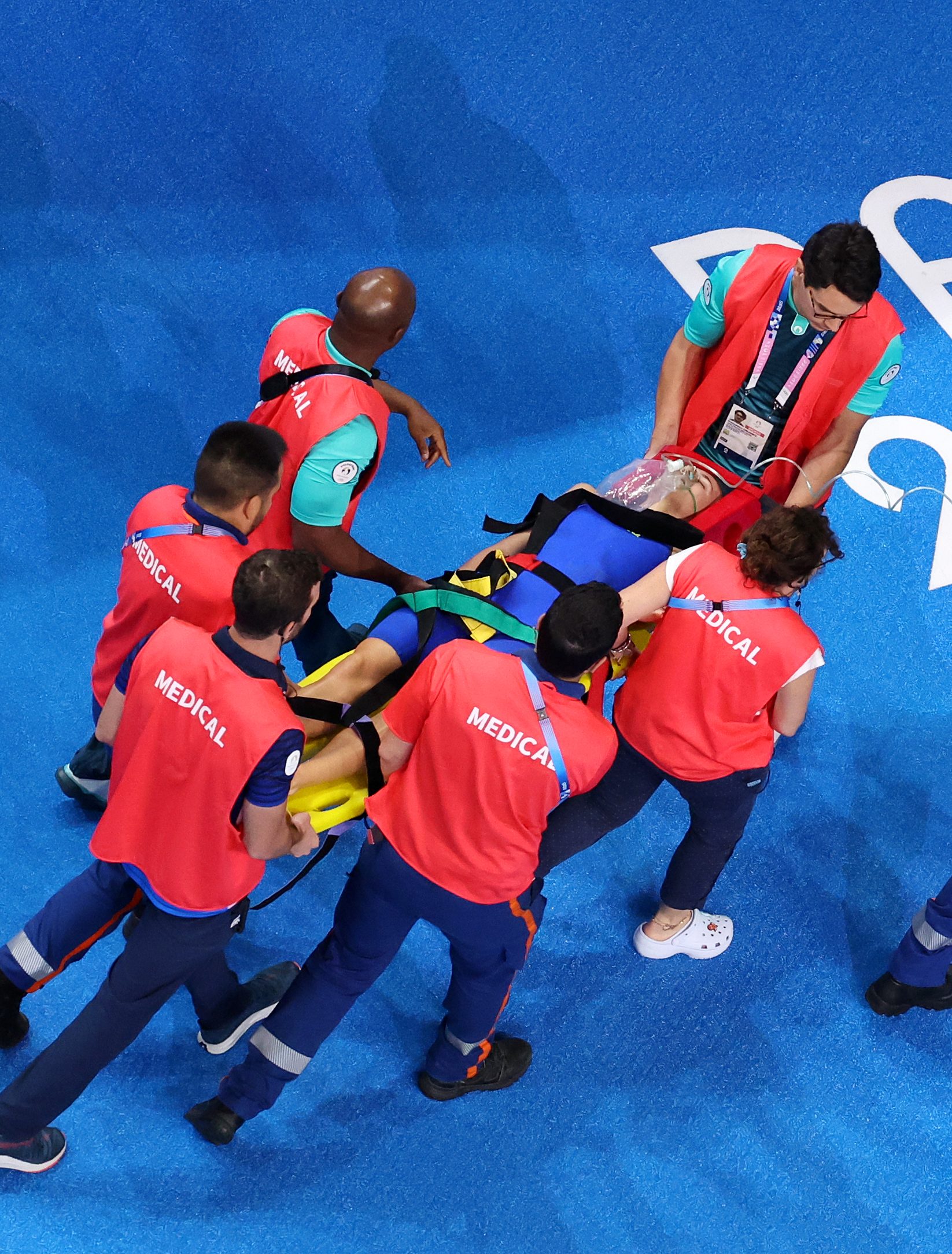 Tamara Potocka of Team Slovakia leaves the arena on a stretcher with medical staff