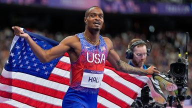 Quincy Hall of Team United States celebrates his gold medal win during the Men's 400m Final